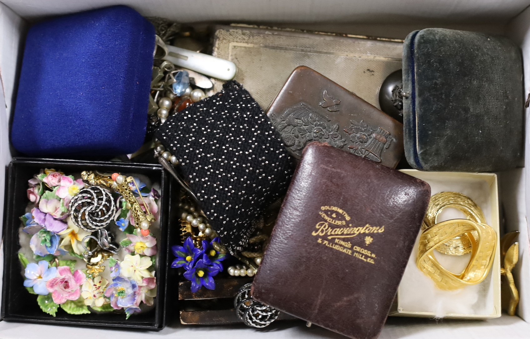 A quantity of assorted costume jewellery, etc. including a silver and enamel handbag mirror.